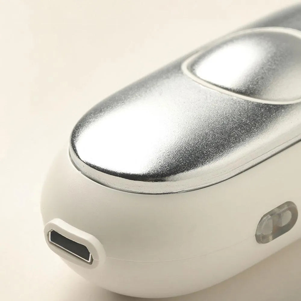 Handheld microcurrent sleep aid device with round button, USB charging port, and stainless steel electrodes in grey green orange colours