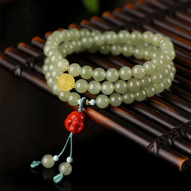 Pale blue Hetian jade bracelet with 6mm beads in three-circle pattern