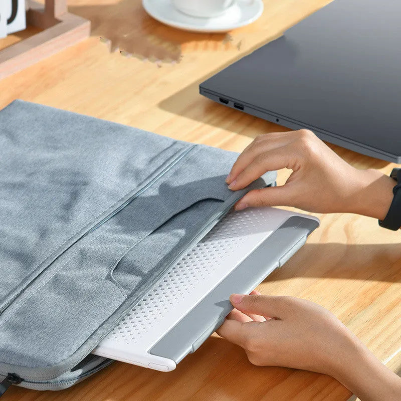 Dongdong portable alloy notebook stand 287x207x0.8mm in Black, shown with a laptop