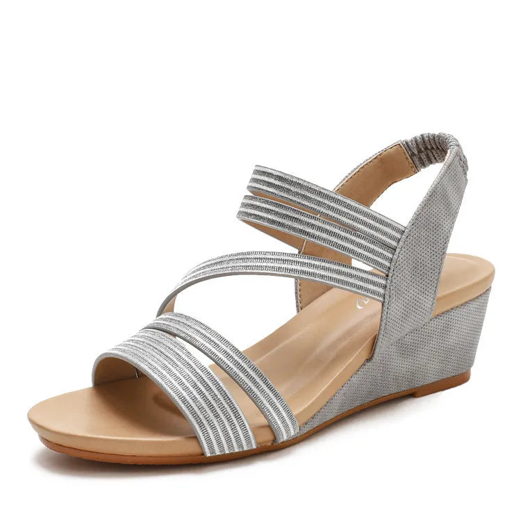 Women's platform sandals in gold colour with a soft leather sole and artificial PU upper