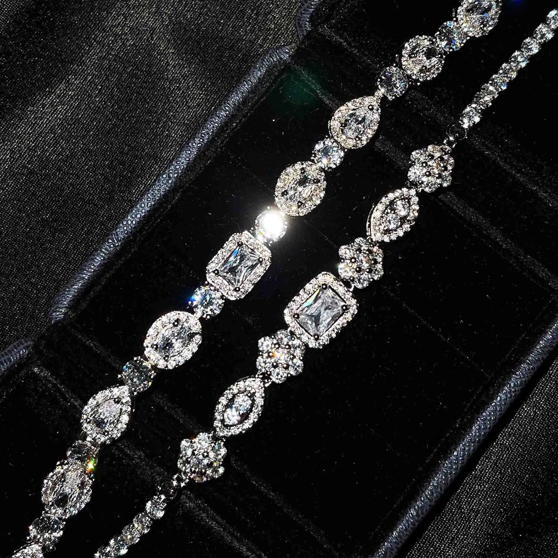 Geometric women's silver bracelet with zircon stones, shown in two length options.