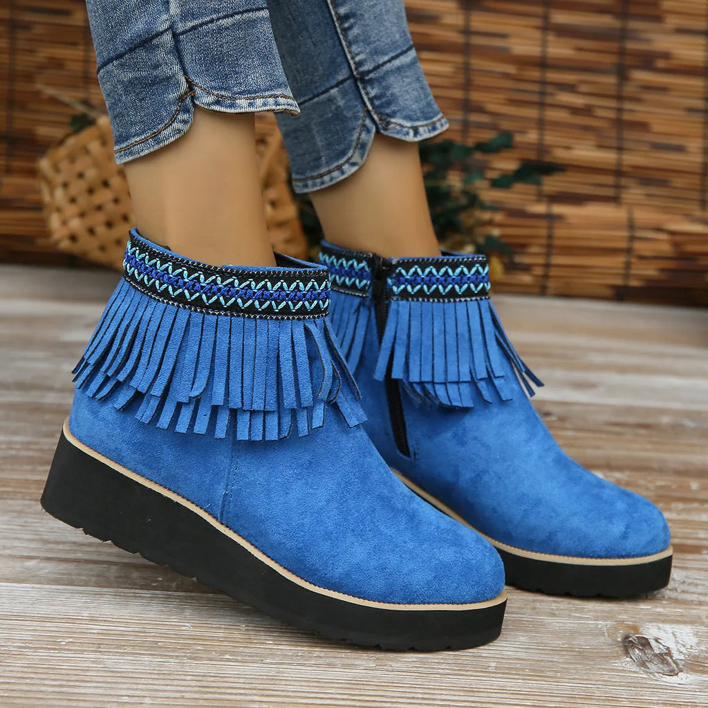 Women's suede wedge ankle boot with thick rubber sole and side zip in black, blue, or dark brown