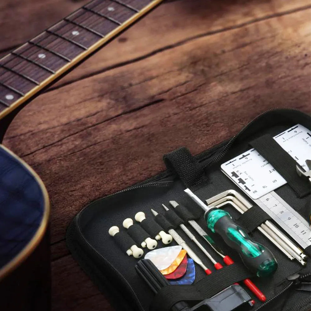Black plastic case for a guitar repair tool kit, shown with dimensions 200mm by 100mm.