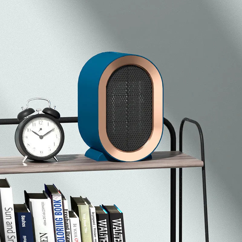 Desktop ceramic heater in black with mechanical controls and UK plug