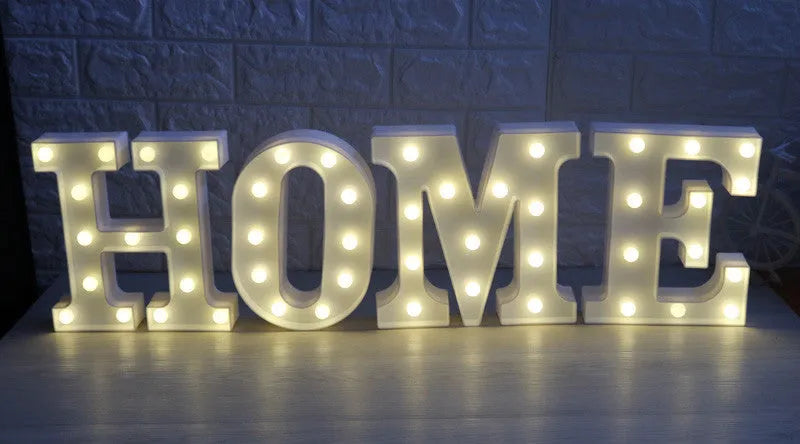 White plastic LED marquee sign letter lamp, 22 cm high, with warm white glow and battery compartment