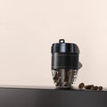 Coffee cup shaped car air freshener in solid fragrance format with plastic construction