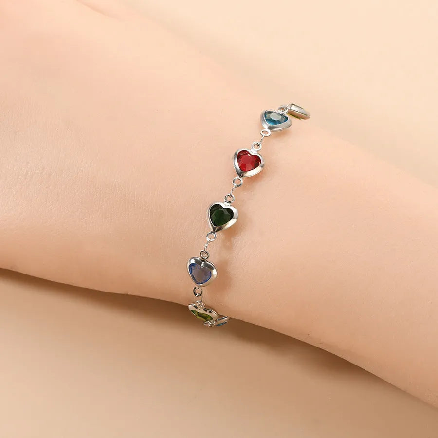 Stainless steel geometric Devil's Eye bracelet shown in one of six colour options: colourful, blue, green, red, light green, or light blue.