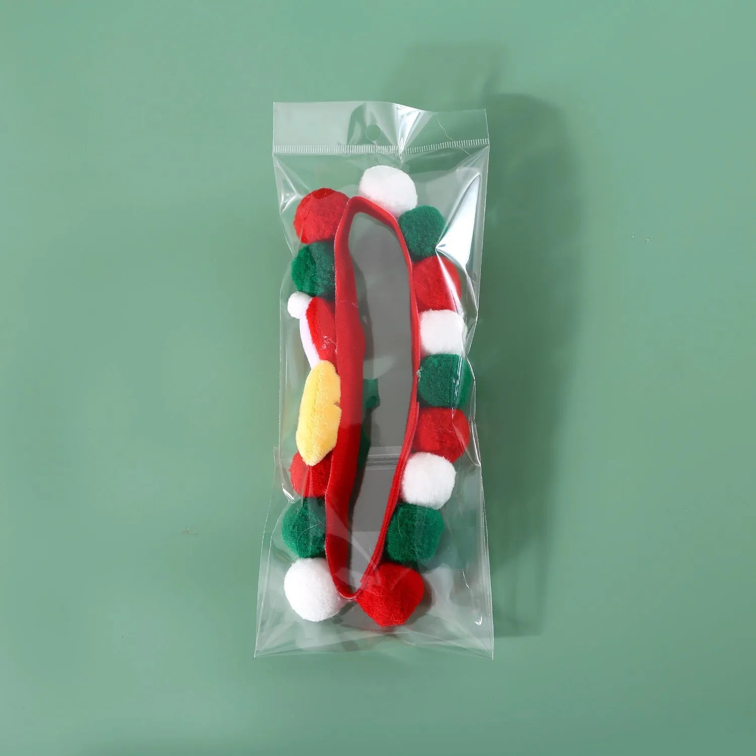 Christmas Series Pet Ball Collar in Bell hat ball style on a pet, plush material, size M