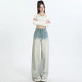 Gradient blue straight-leg women's jeans on a neutral background showing the colour transition.