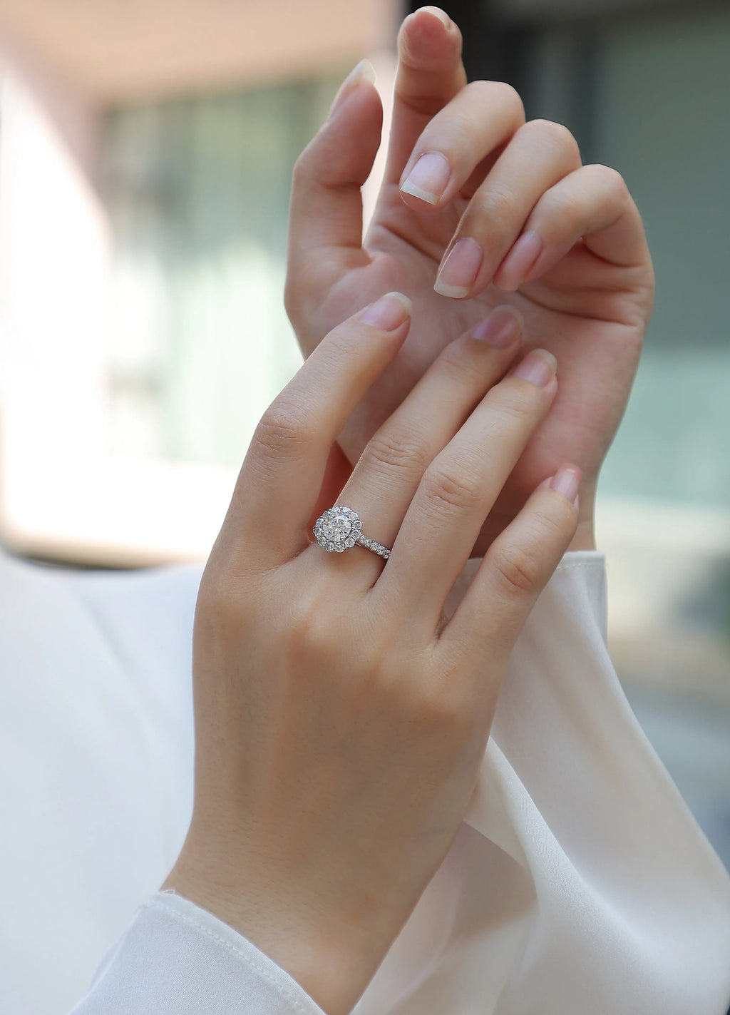 1-carat moissanite wedding ring set in S925 silver with platinum plating on white background