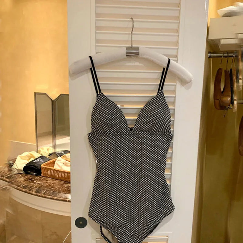 Blue and black women's one-piece swimsuit with cover belly design for small chest sizes