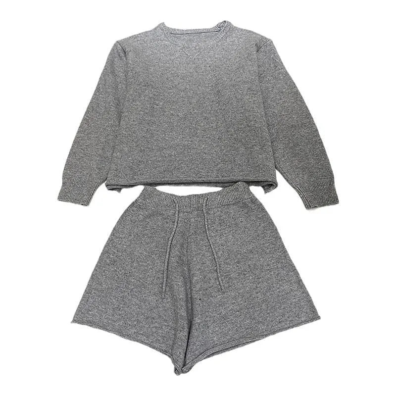 Women's loose-fitting long sleeve sweater and knitted wide leg shorts two-piece set in oatmeal colour.