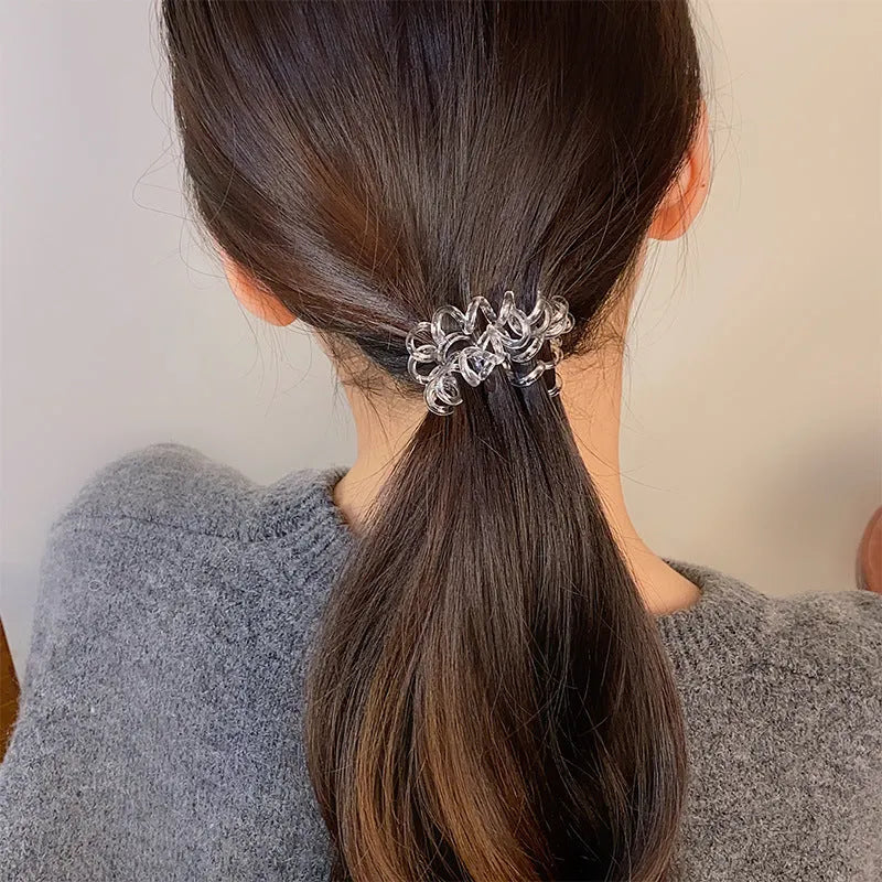 Traceless TPU hair rings in assorted colours on white background