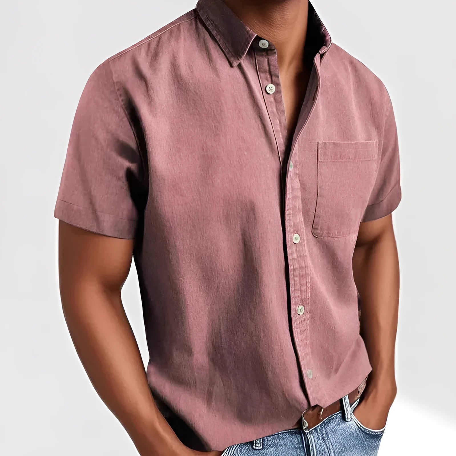 Men's solid colour short-sleeved polo shirt with a classic collar and a single chest pocket.