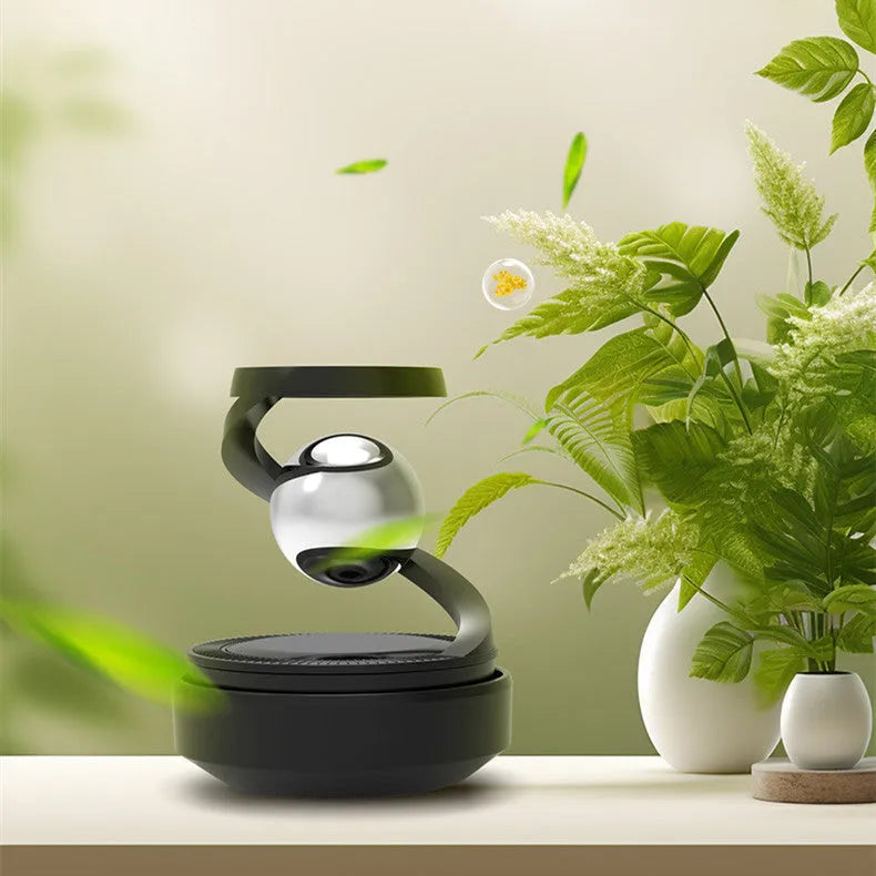 Solar-powered car decoration ornament with aromatic function measuring 65 x 81mm