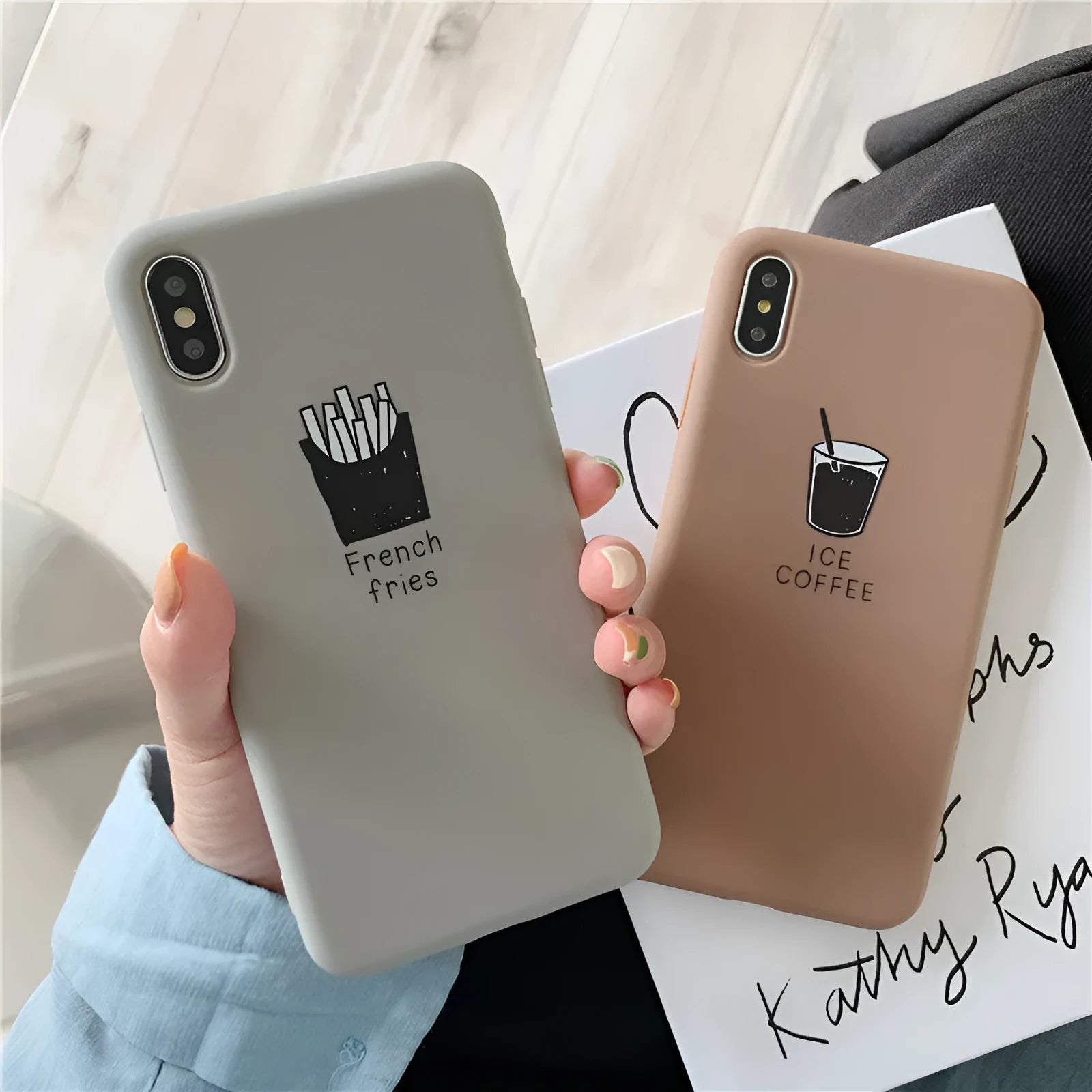 Soft matte silicone iPhone case showing ice coffee and french fries couple-themed designs.