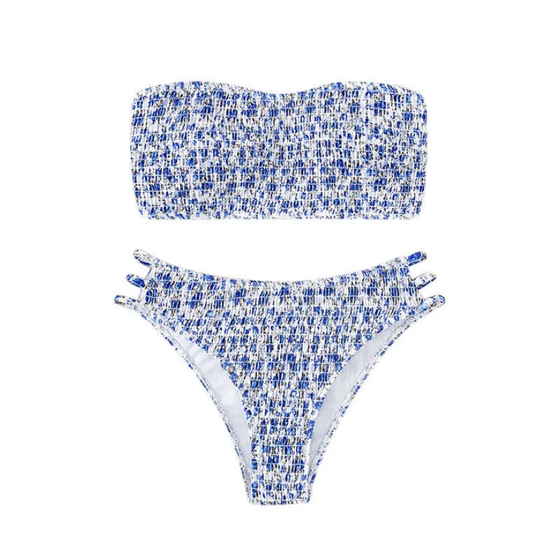 Women's floral strapless swimsuit with high-waisted briefs, open back, and split front design on a mannequin.