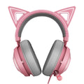 Pink glowing cat earphones with wired USB connection and head-mounted design on a desk