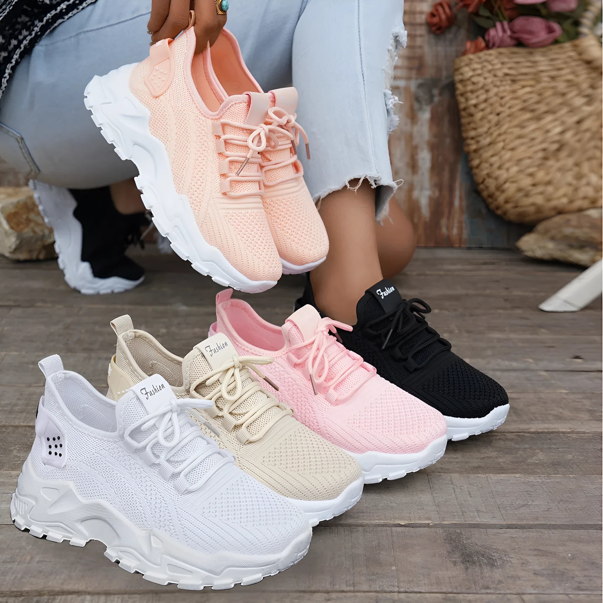 Women's white Flyknit mesh sports casual shoes with flat heel and lace-up front.