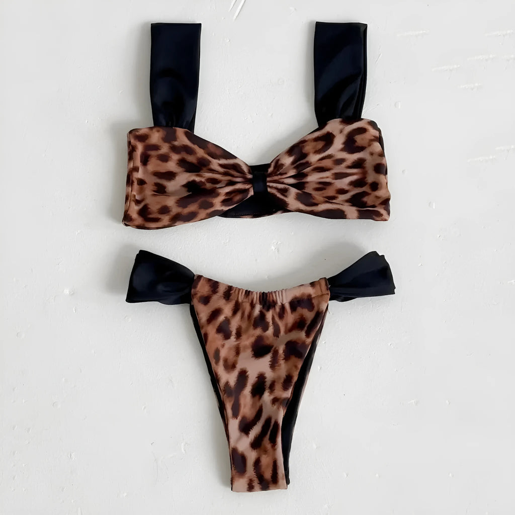 Women's leopard print bikini set with tube top and split bottoms in black and animal print