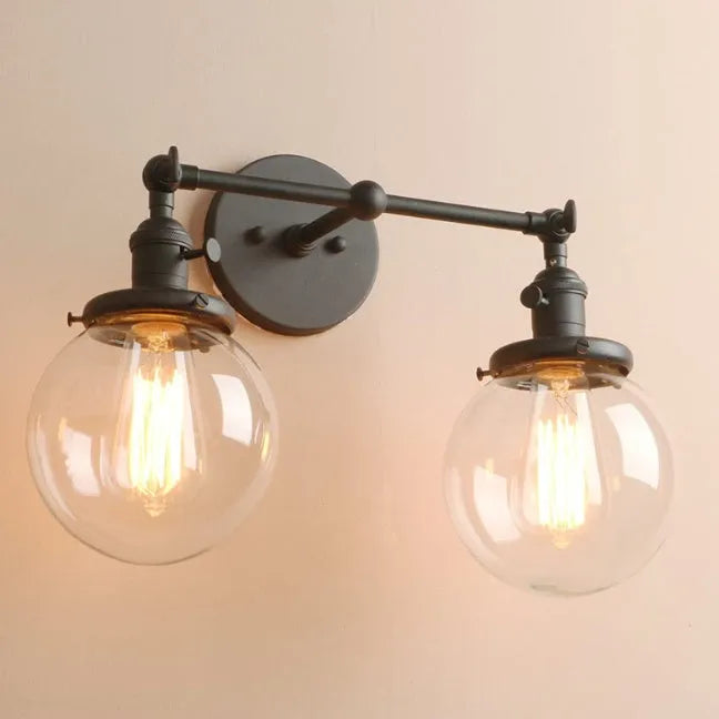 Double headed industrial wall lamp with spherical glass shades, iron black finish, 15x12x24cm
