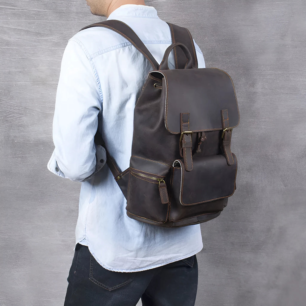 Brown crazy horse leather backpack with double shoulder straps and soft handle