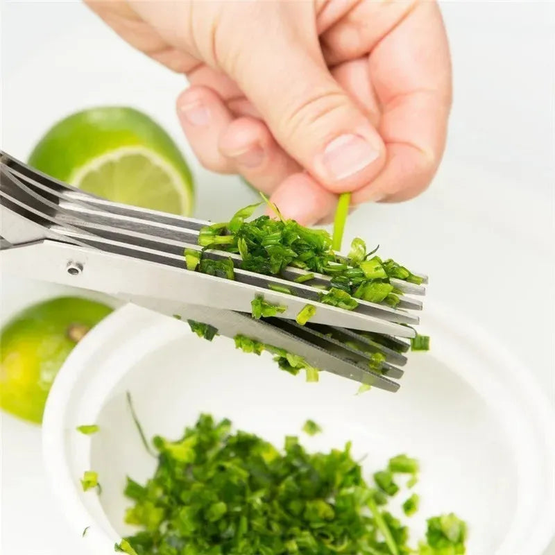 Green multi-layer stainless steel kitchen scissors for cutting herbs and green onions.