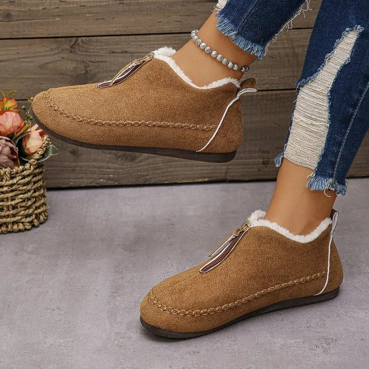 Women's suede retro low top boots in black showing low-top profile and rubber sole