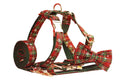 Green snowflake Christmas pet collar set with matching dog leash, bow decoration and vest in four-piece bundle