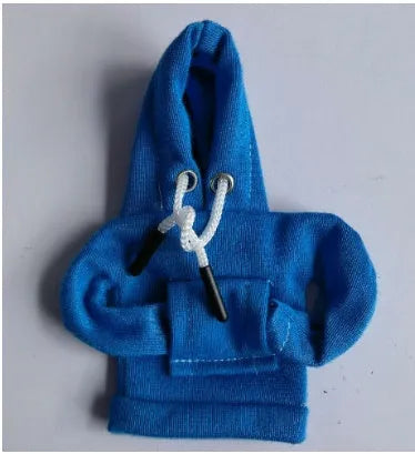 Cloth car gear shift knob hoodie cover in multiple colour options next to a gear lever.