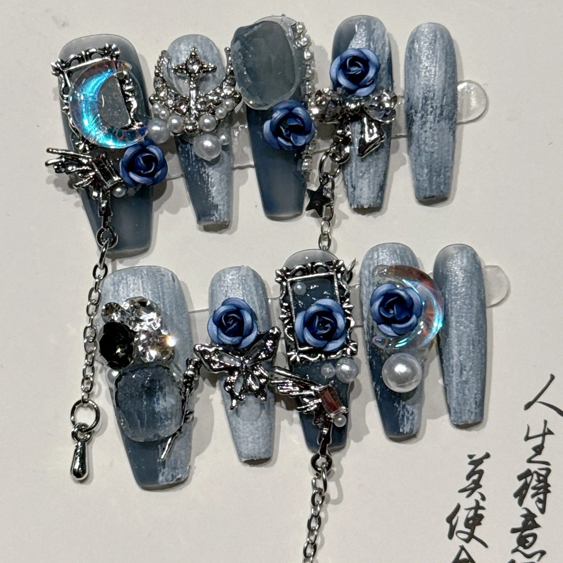 Heavy industry night blue artificial nails with 3D rose and tulip designs, showing sizes XS, S, M, L.