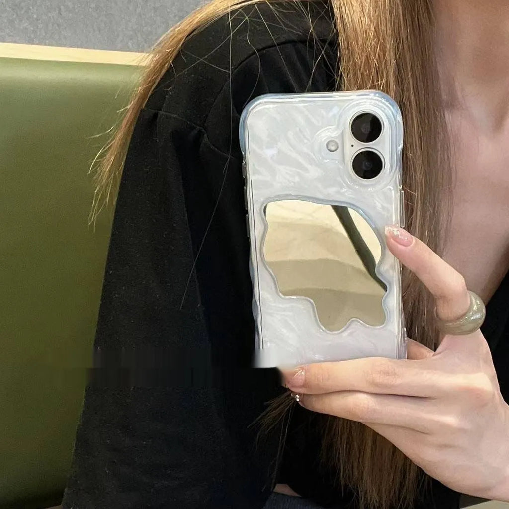 Water ripple solid colour mirror iPhone case in beige, shown on an iPhone