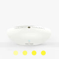 White rechargeable sleep sound machine with mechanical buttons on a white background