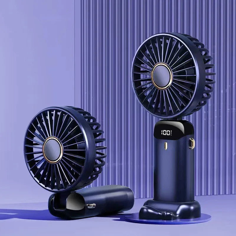 Blue portable USB rechargeable fan shown in handheld mode, with folding neck strap and digital battery display