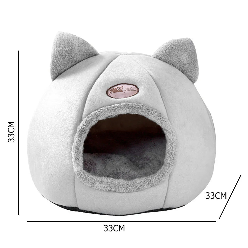 Fully enclosed plush cat winter nest sofa bed with removable cushion, shown in grey