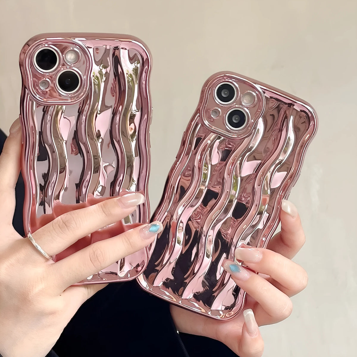 Electroplated water ripple iPhone case in silver with anti-fall TPU construction for iPhone 11-14 models.