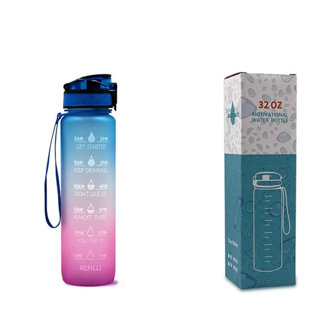 Blue and red gradient 1 litre Tritan sports water bottle with time markers and a black flip-top lid.
