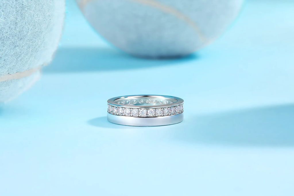Moissanite wedding ring with gold-plated S925 silver setting on a white background