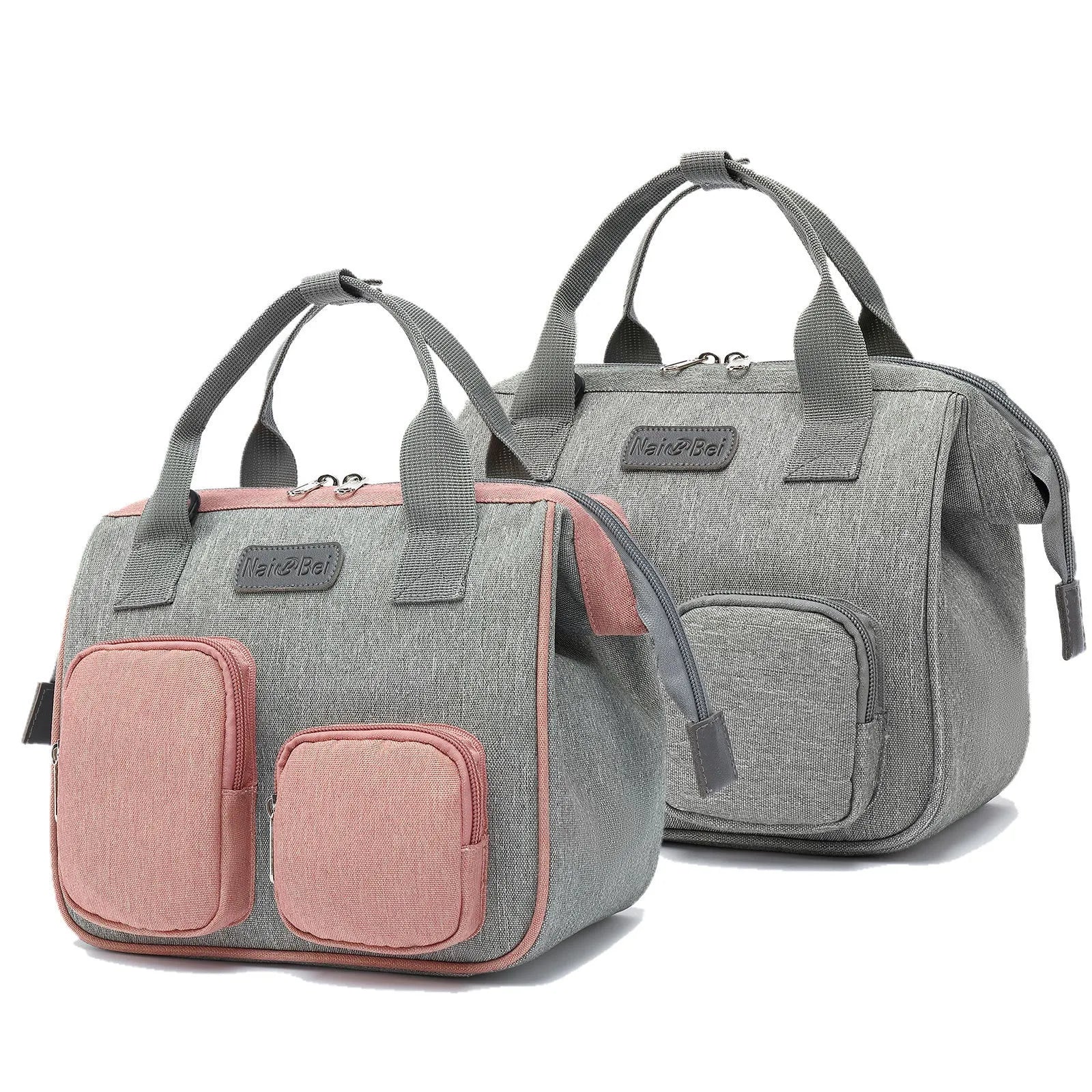 A grey oxford cloth handbag showing its large main compartment and external three-dimensional pocket.