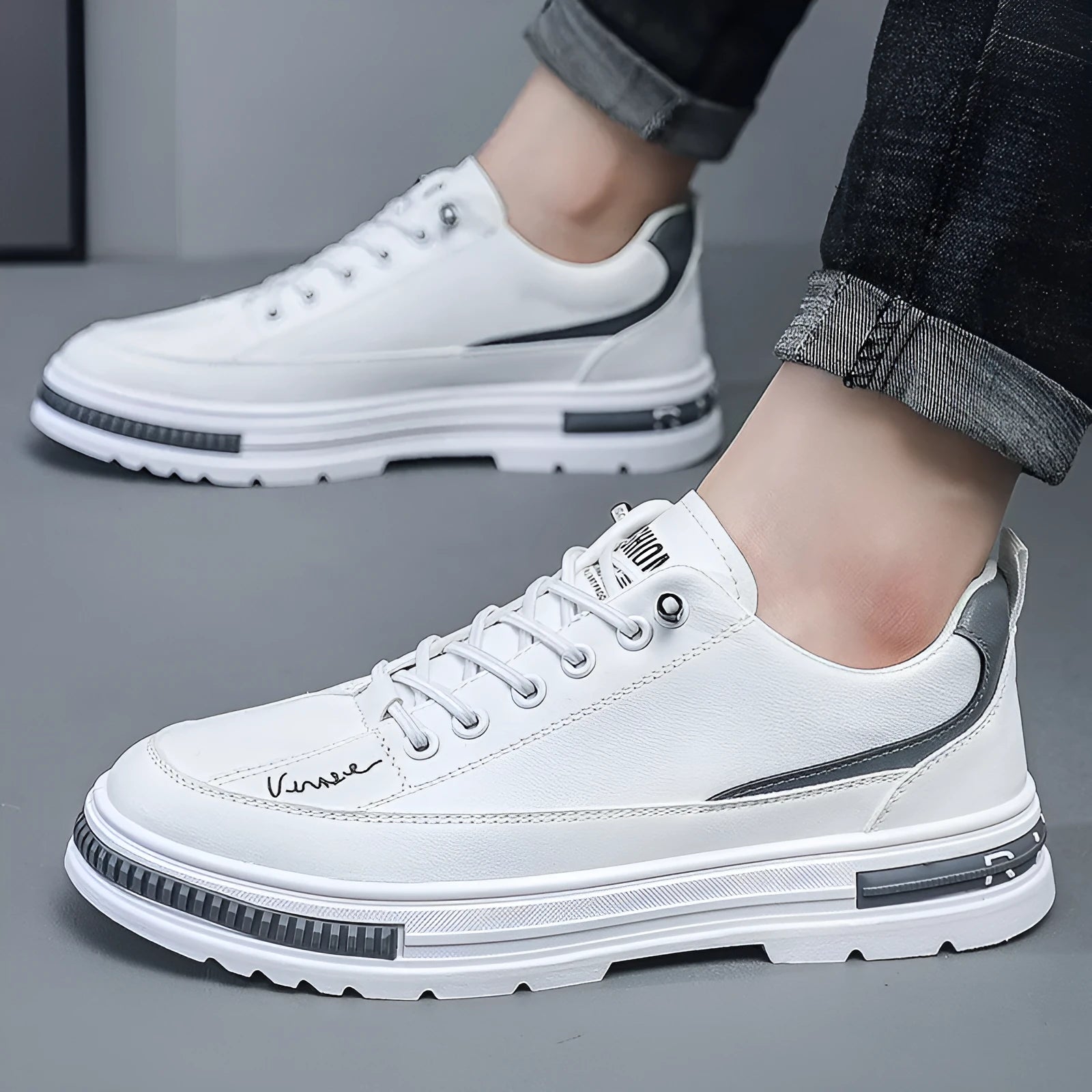 Men's black and white platform sneakers with elastic bands and round toe design