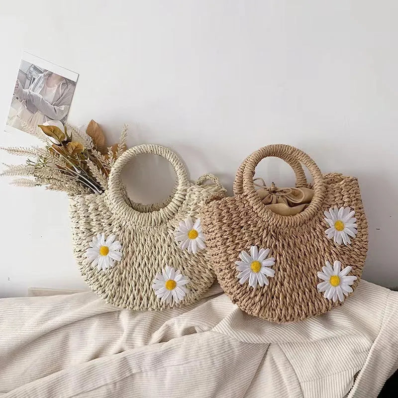 Women's light brown straw-weaved crossbody bag with daisy decoration measuring 25x20x8cm