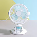 Mini USB desk fan with clip attachment and three blades, shown in desktop setting.