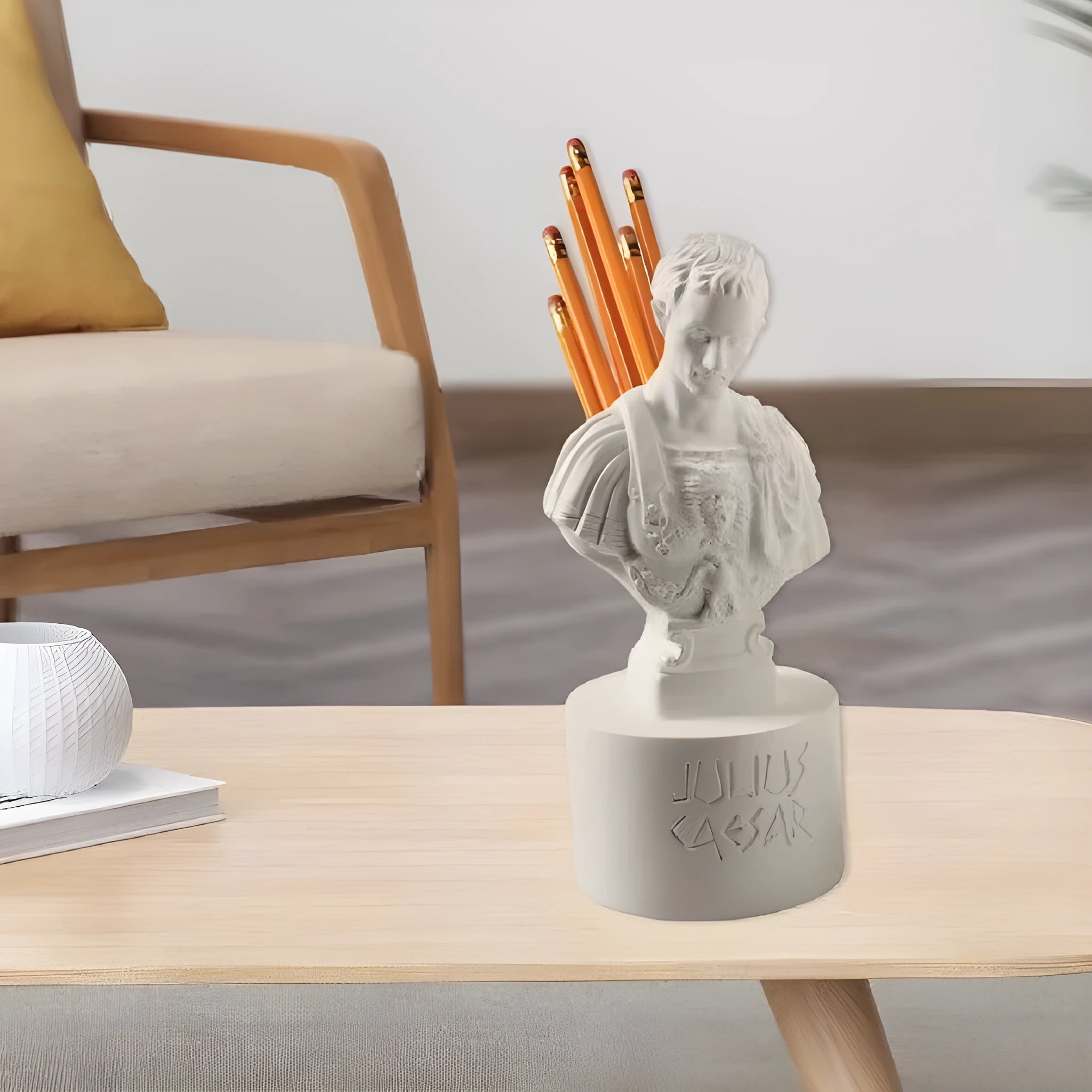 White synthetic resin American creative character model pen holder on a desk.