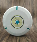 Black or white automatic robot vacuum cleaner with wide cleaning head on wooden floor.