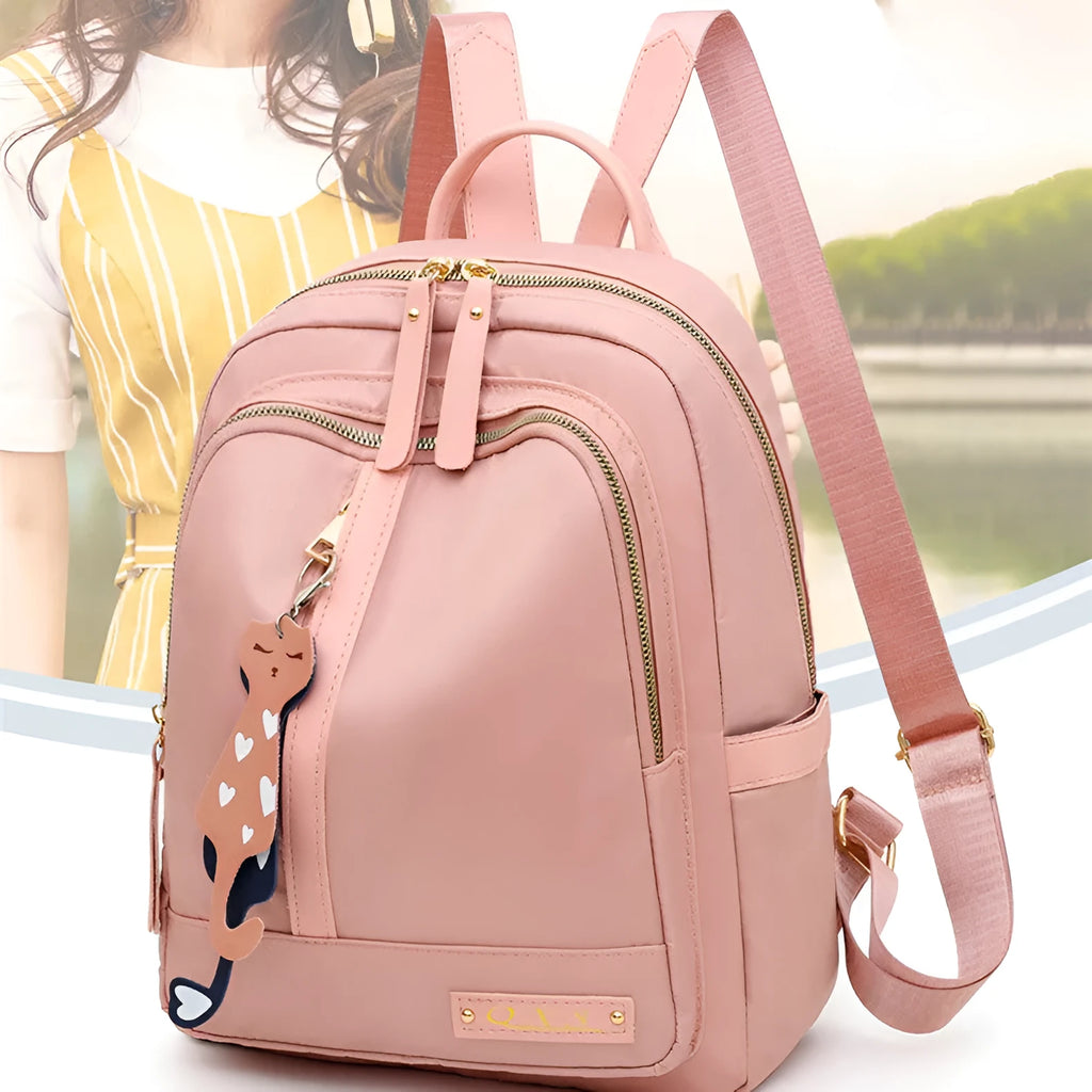 Black nylon casual backpack with external pockets, shown with adjustable straps and a soft handle.