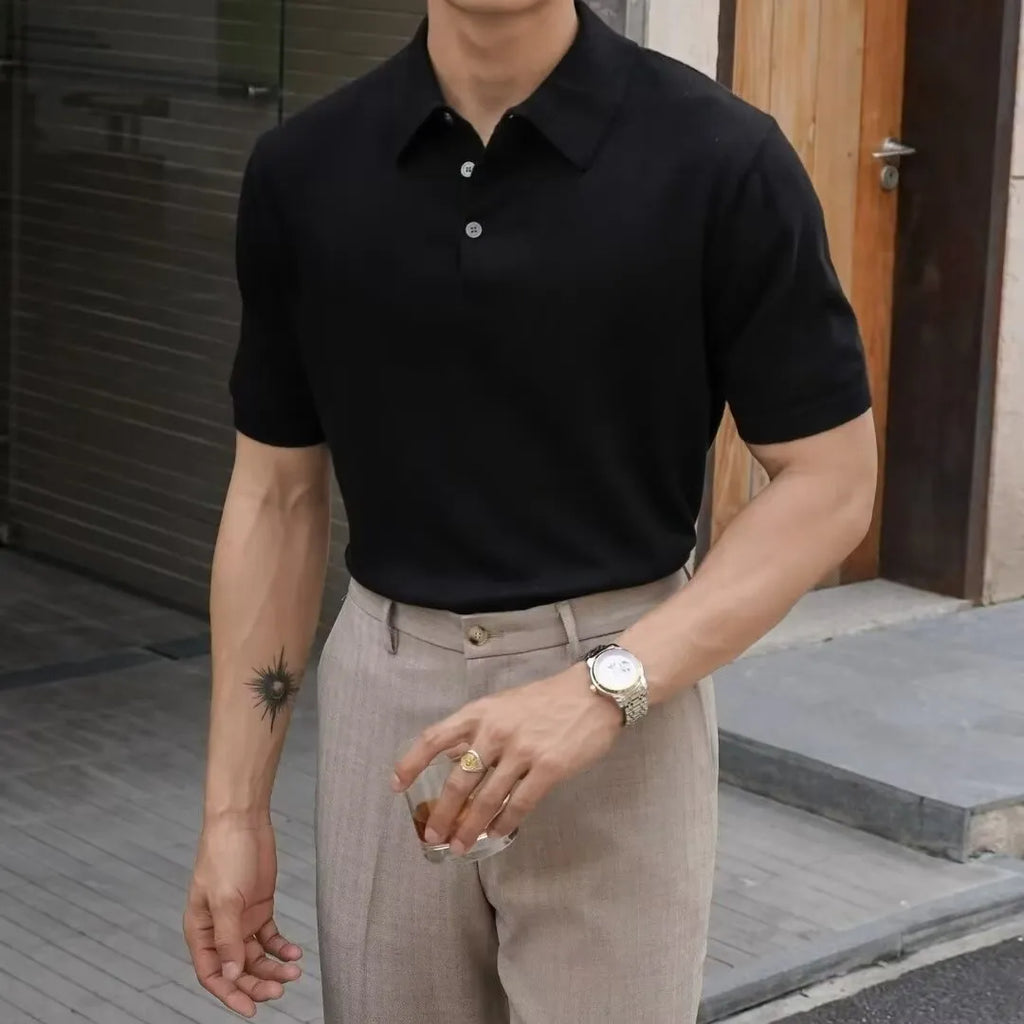 Men's black short sleeve polo shirt with a cotton ice silk knit and classic collar.
