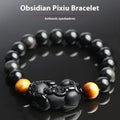 Black Mexico Gold Sheen Obsidian Pi Xiu crystal bracelet with ethnic design