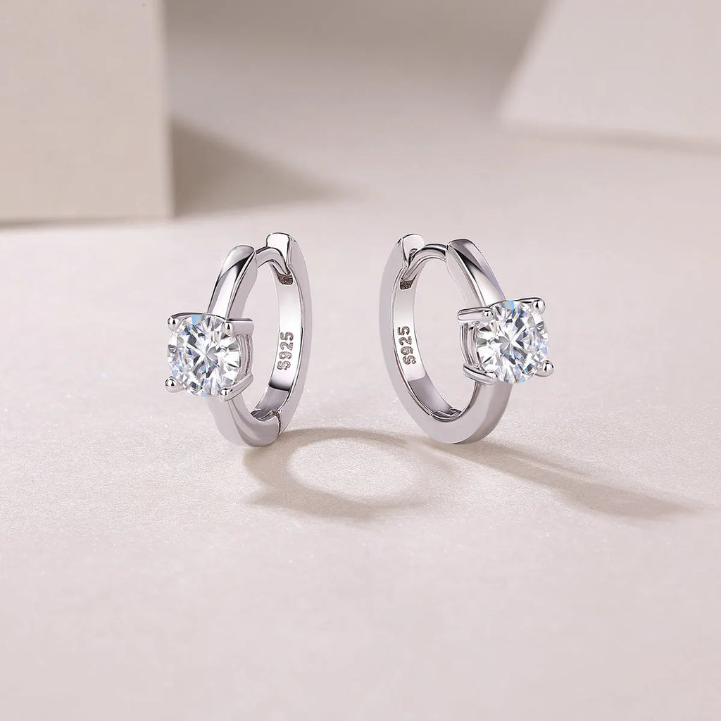 0.5-carat top-quality moissanite stud earrings in S925 silver with platinum plating on white background