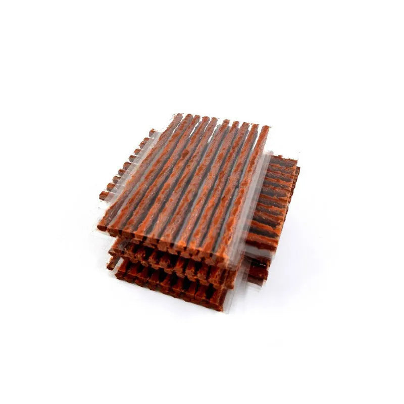 Brown and black vacuum car tire repair strips, 3.5mm x 100mm, made of butyl rubber.