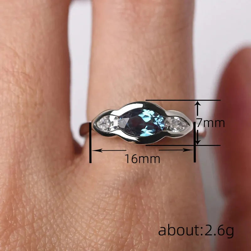 Women's geometric ellipse copper ring with inlaid zircon stones in white gold colour